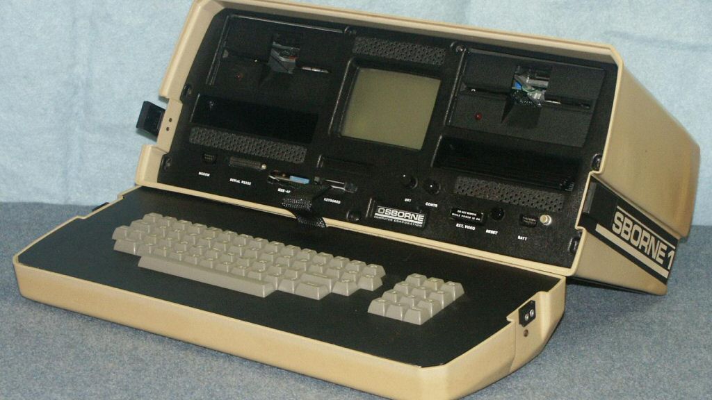 This is the <a href='https://en.wikipedia.org/wiki/Osborne_Computer_Corporation'>Osborne 1</a>, a cutting-edge computer of the time period. Its 64kb of RAM means it can only store 0.001% of the data from a DVD. Heck, it wouldn't even be able to fit this picture of itself (90kb) into memory. Oh, and the Osborne 1 didn't actually come out until 1981, so it's still a bit beyond the reach of consumer hardware in 1977.