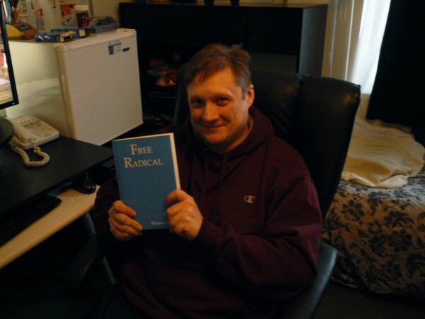 Here I am, holding the completed book years later.